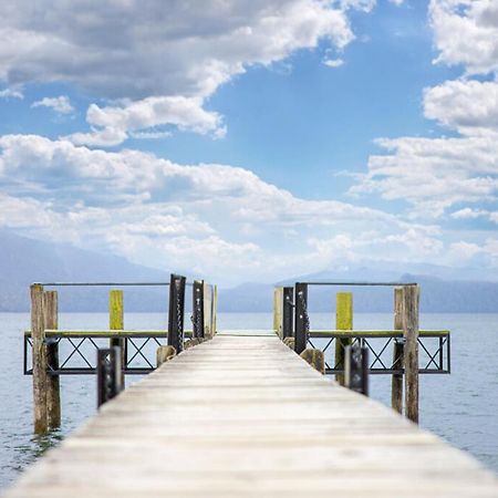 Tasman Holiday Parks - Те-Анау Экстерьер фото The pier at the lake
